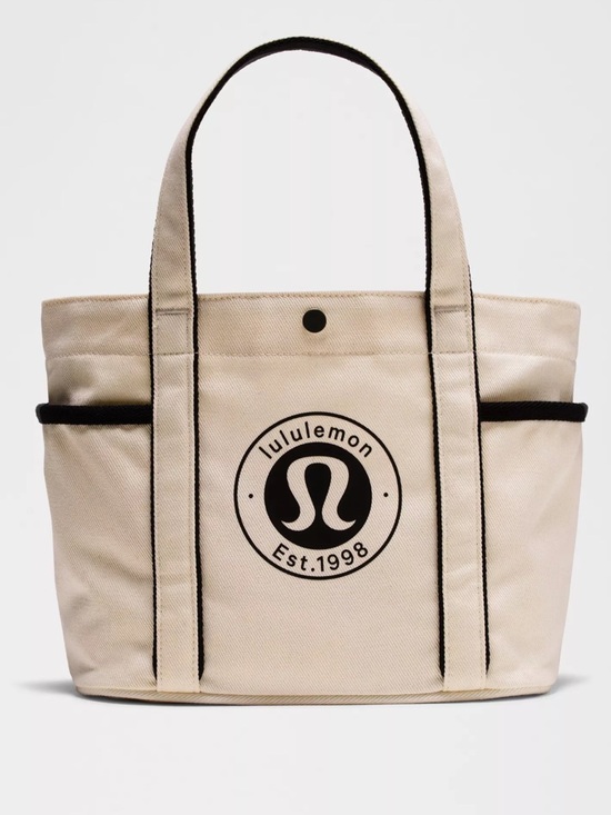 lululemon athletica Handbags - lululemon athletica Cream Tote Bag with Black Trim